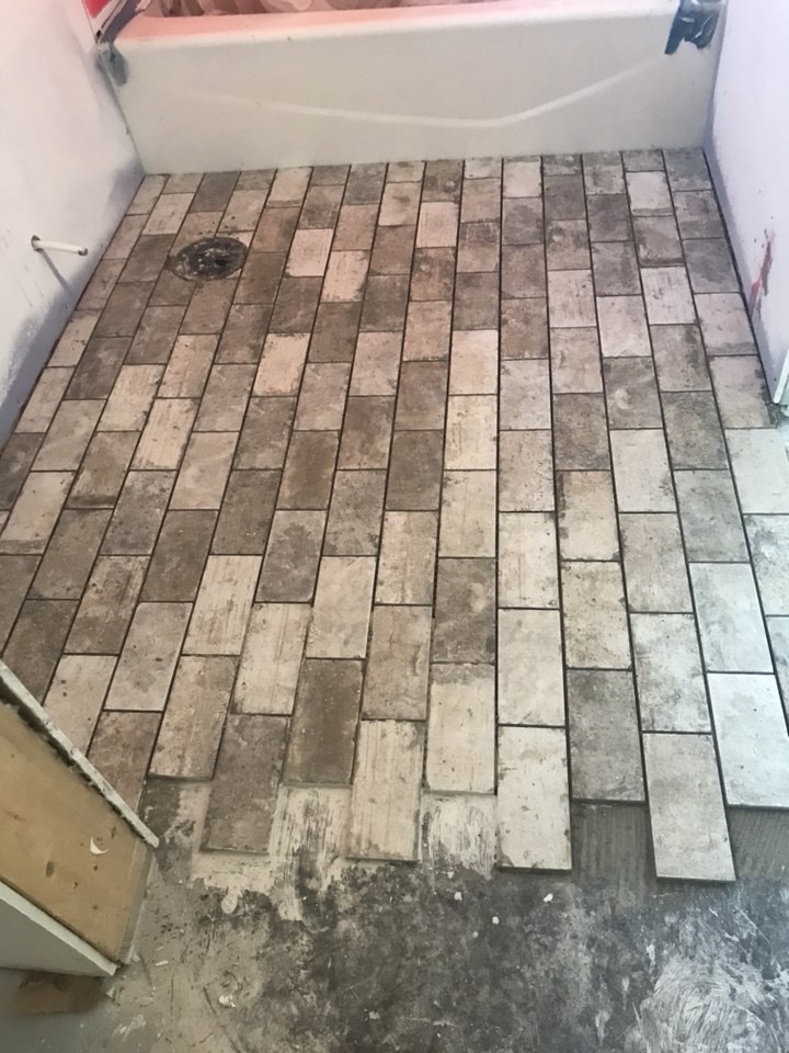 6-tile flooring going down