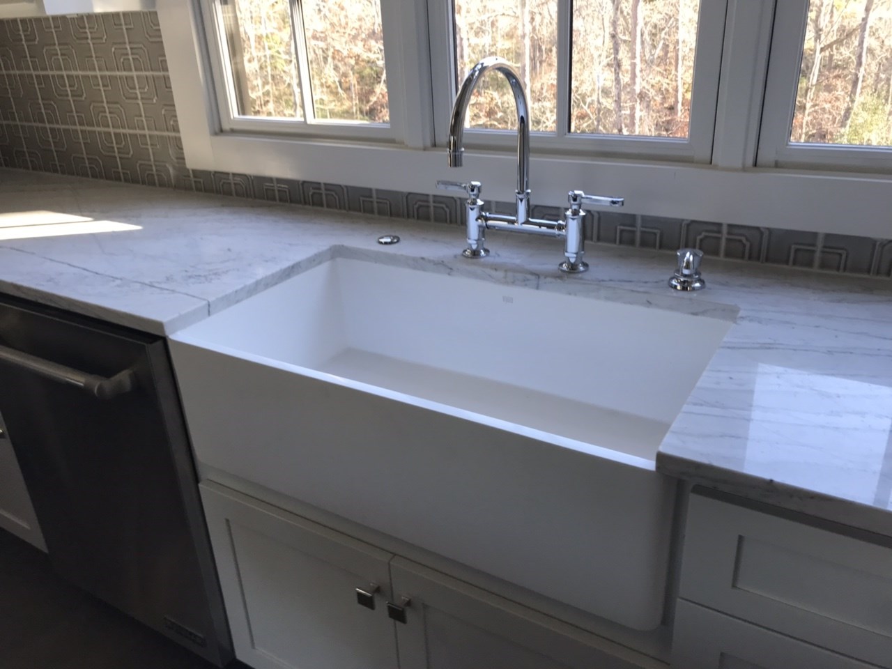 8-apron sink with bridge faucet